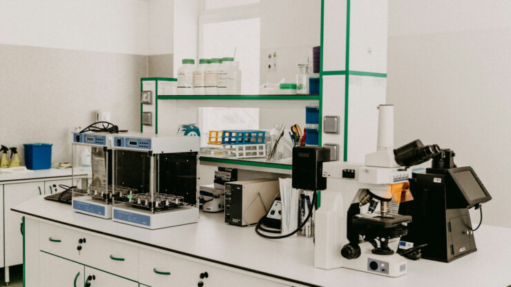 Laboratory workbench with a microscope and test instruments